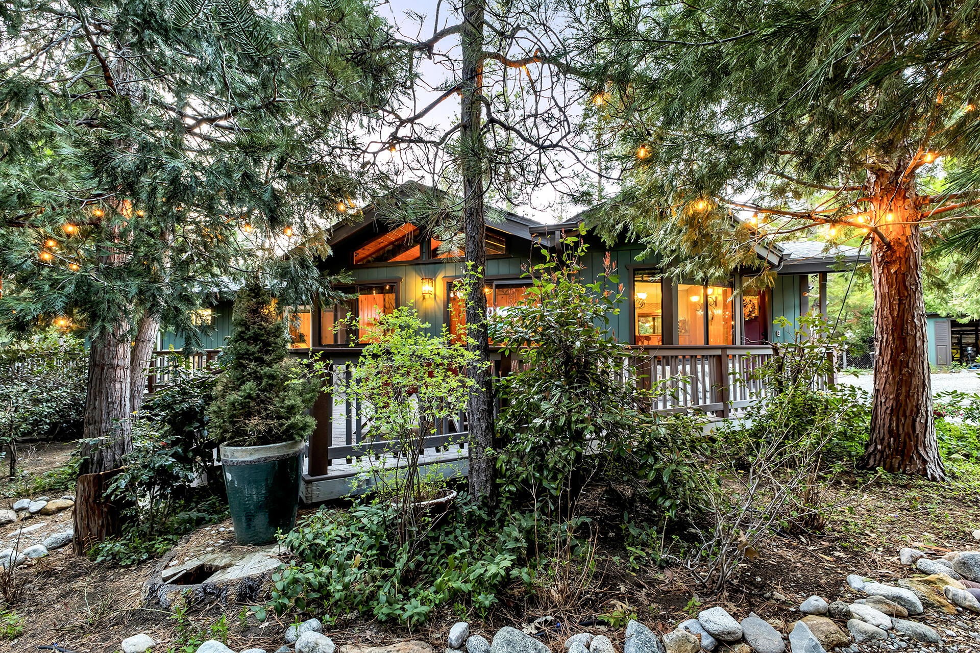 54580 Reed Lane Idyllwild, CA 92549 - Photo 87 of 101 a front view of a house with a yard and fountain in middle