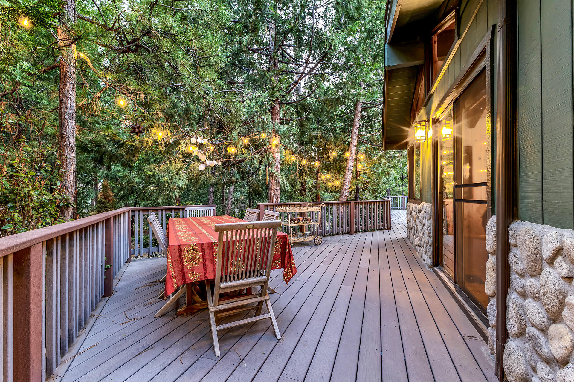 54580 Reed Lane Idyllwild, CA 92549 - Photo 92 of 101 a view of balcony with wooden floor and outdoor seating