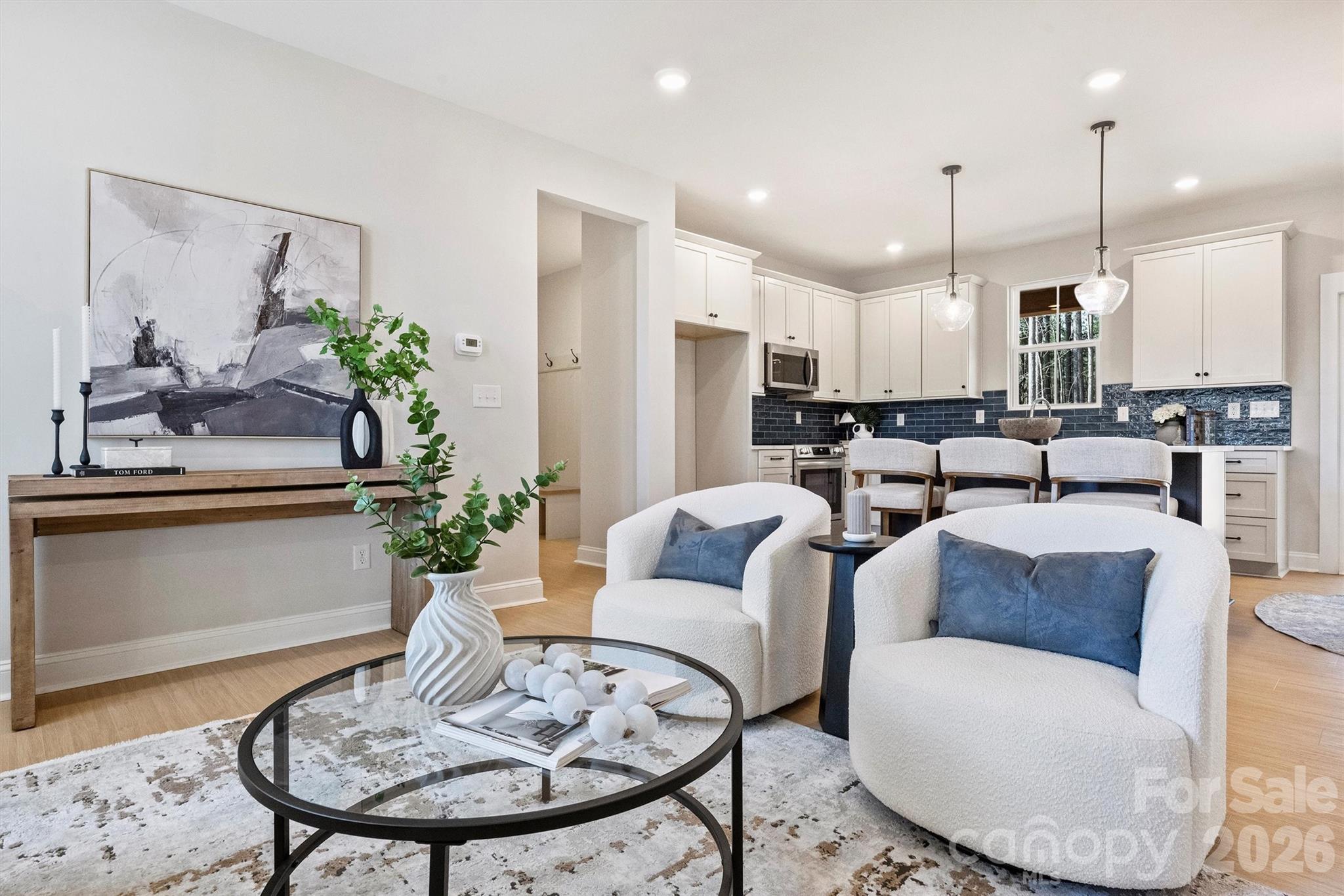 2295 Lee Lawing Road Lincolnton, NC 28092 - Photo 11 of 43 a living room with furniture potted plant and a table