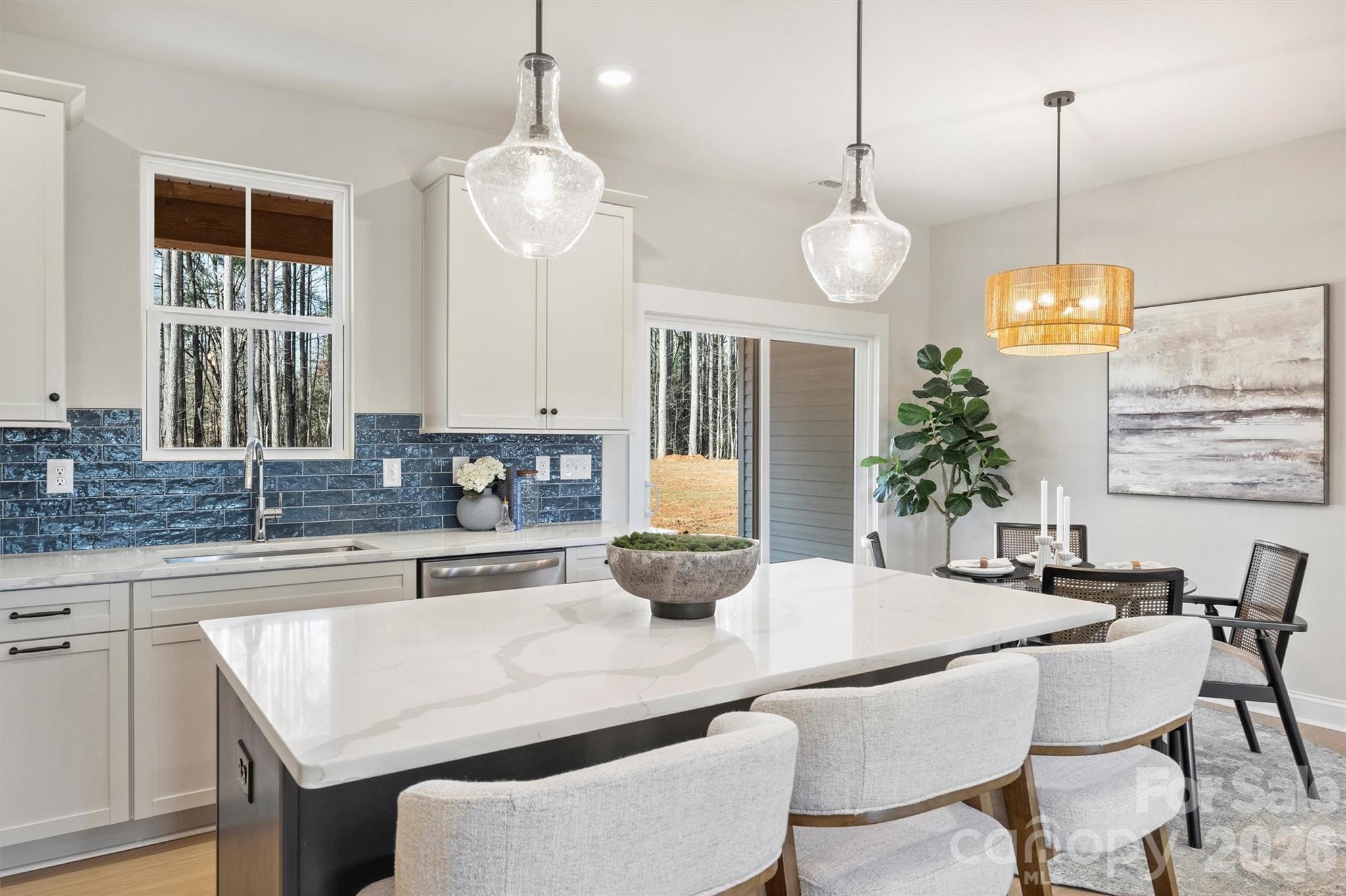 2295 Lee Lawing Road Lincolnton, NC 28092 - Photo 17 of 43 a kitchen with a table and chairs in it