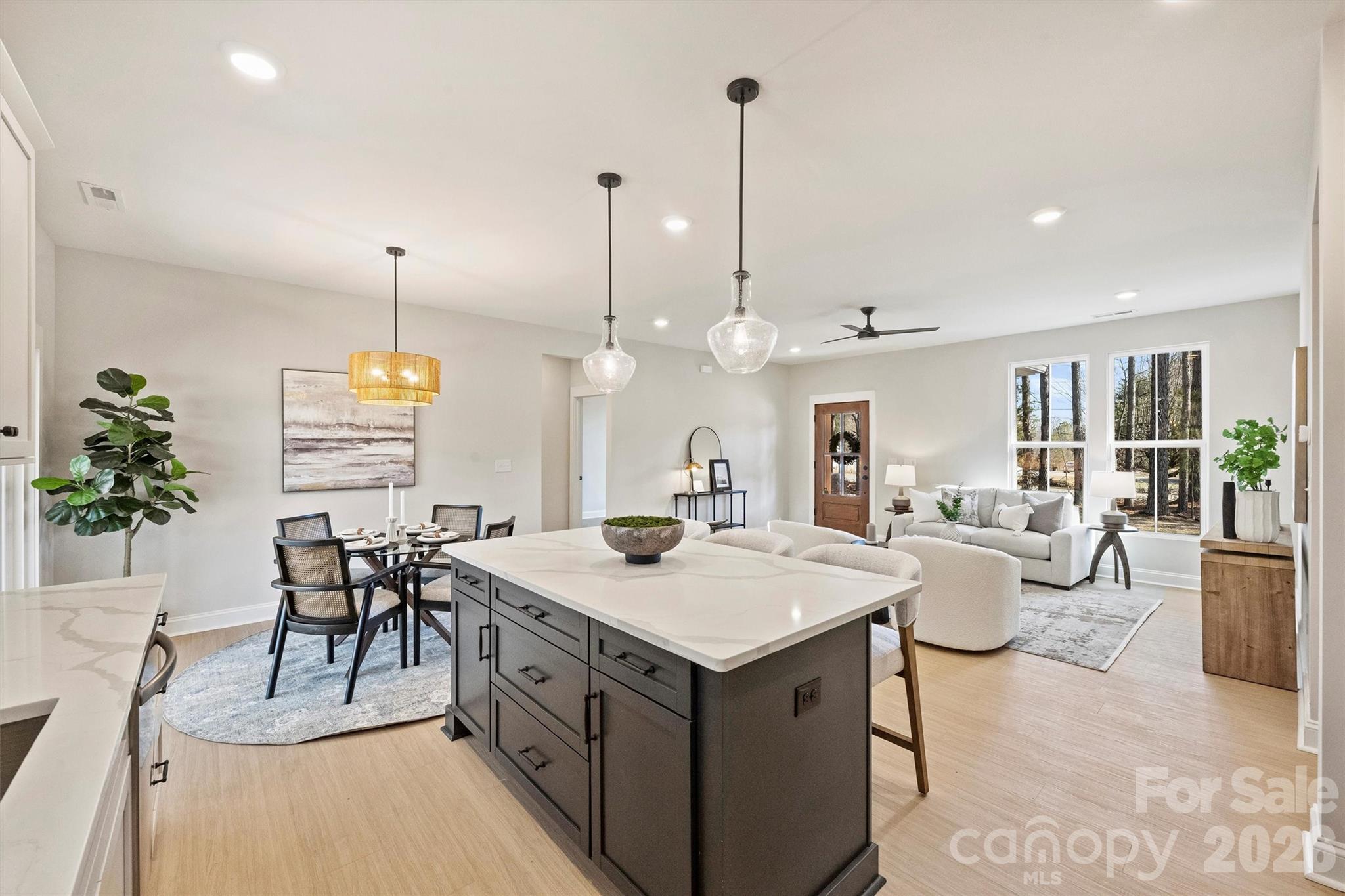2295 Lee Lawing Road Lincolnton, NC 28092 - Photo 19 of 43 a large kitchen with kitchen island a large island in it