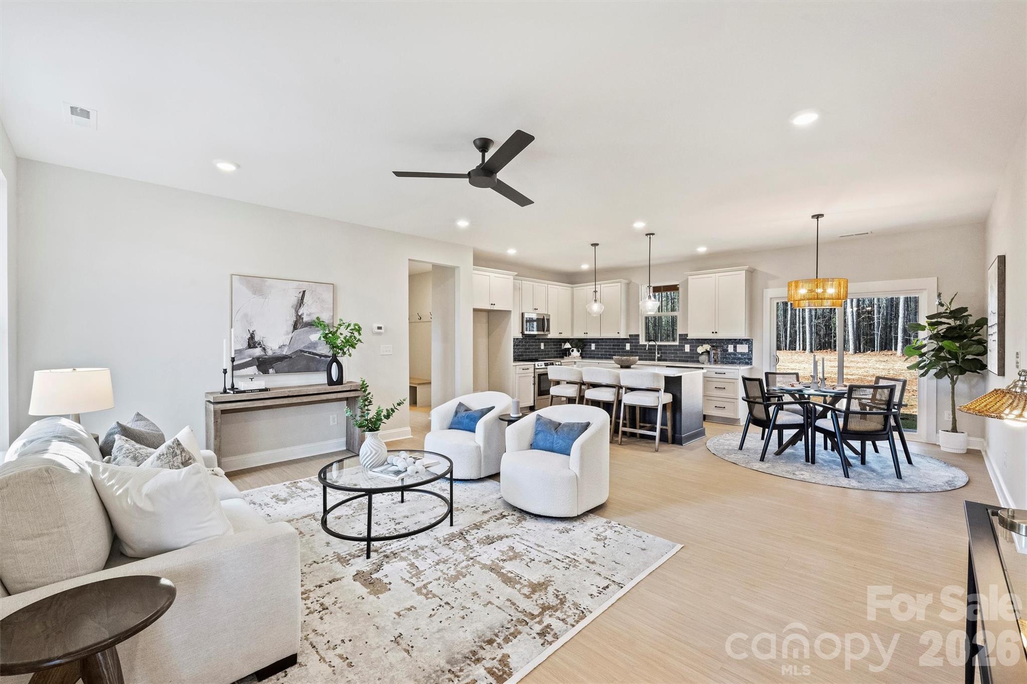 2295 Lee Lawing Road Lincolnton, NC 28092 - Photo 2 of 43 a living room with lots of furniture and kitchen view