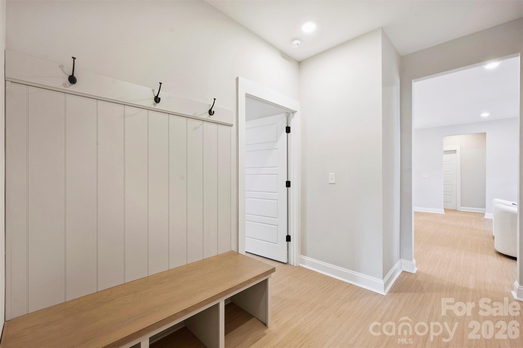 2295 Lee Lawing Road Lincolnton, NC 28092 - Photo 30 of 43 a view of a hallway with wooden floor