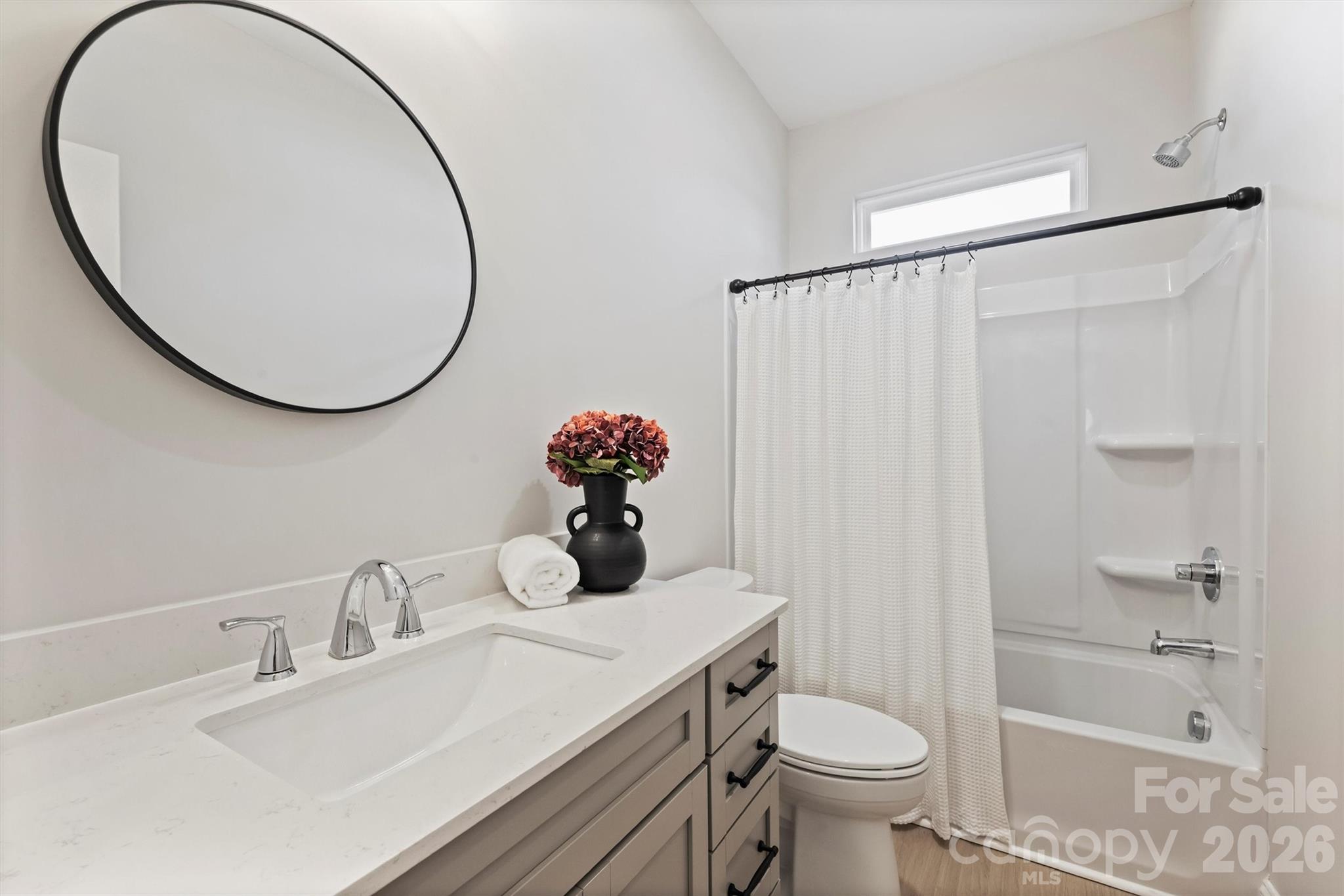 2295 Lee Lawing Road Lincolnton, NC 28092 - Photo 35 of 43 a bathroom with a sink toilet and a mirror