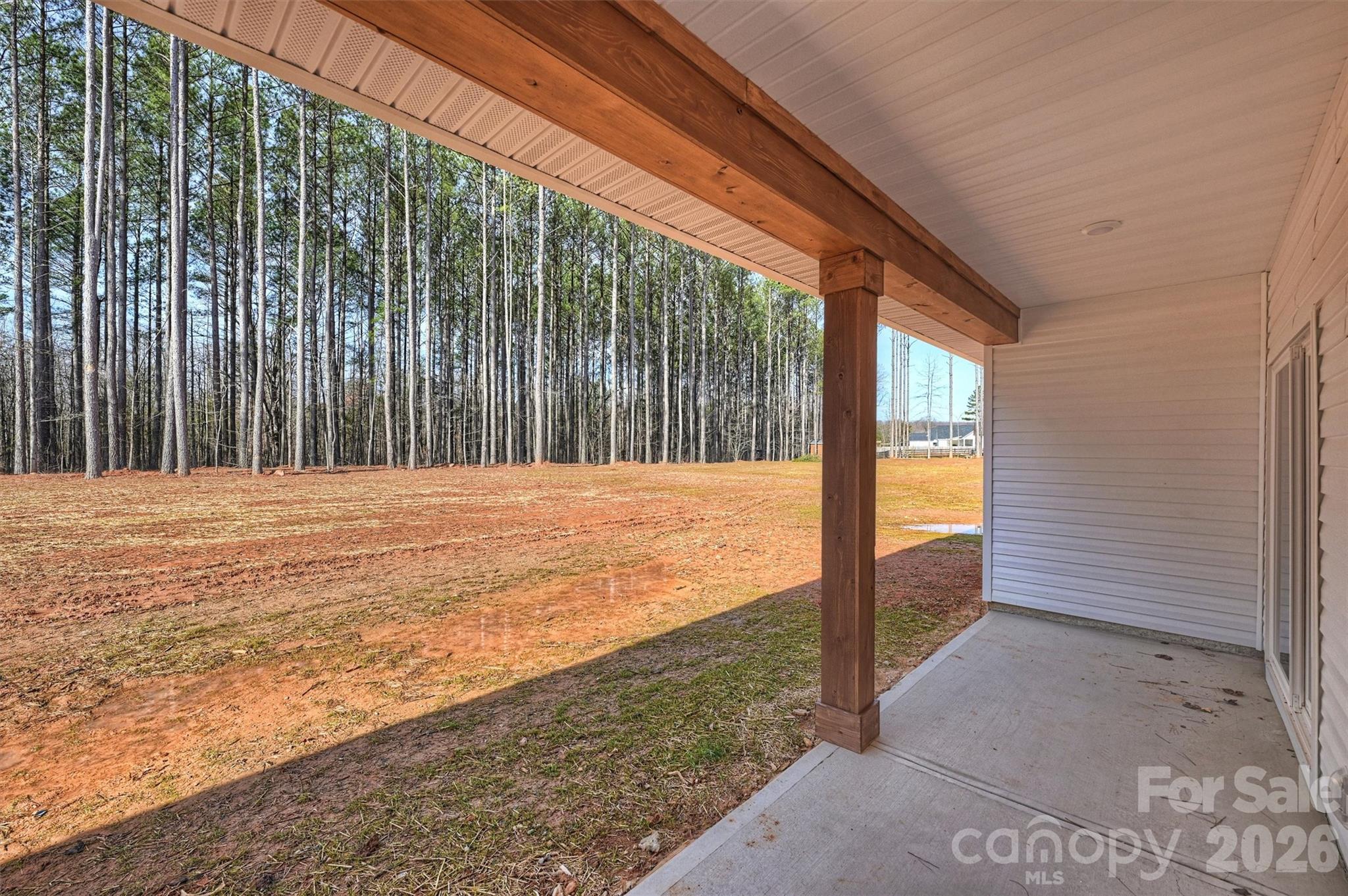 2295 Lee Lawing Road Lincolnton, NC 28092 - Photo 38 of 43 a view of swimming pool with an outdoor space and seating area