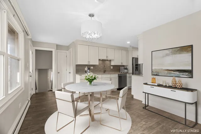 a view of a dining room with furniture