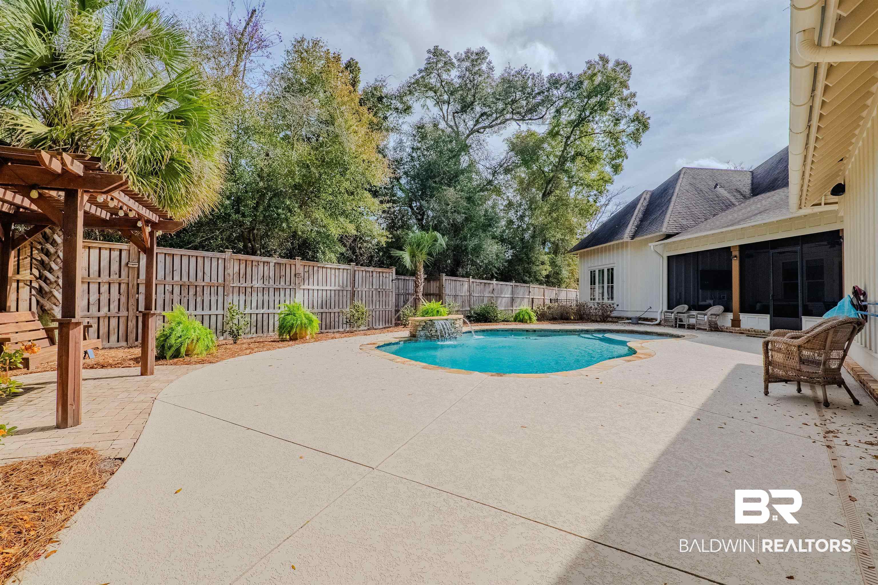 708 Manning Place Fairhope, AL 36532 - Photo 48 of 58 View of swimming pool with a patio, pool water feature, and a pergola