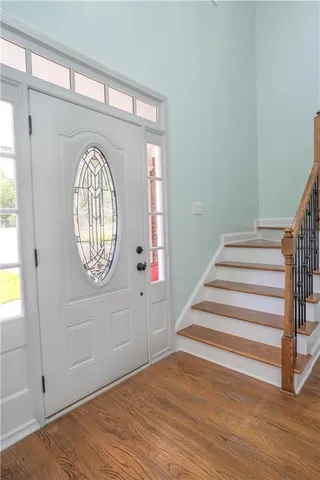 a view of entryway with wooden floor