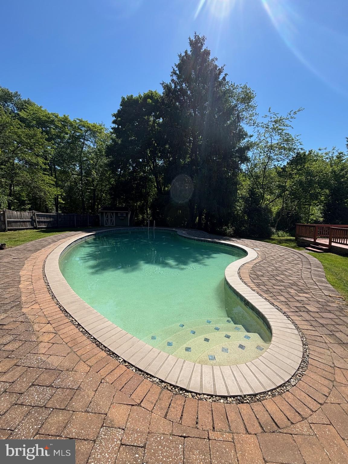 20 Bock Boulevard Howell, NJ 07731 - Photo 15 of 32 a view of a swimming pool with a yard