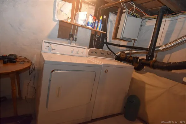 a utility room with dryer and washer