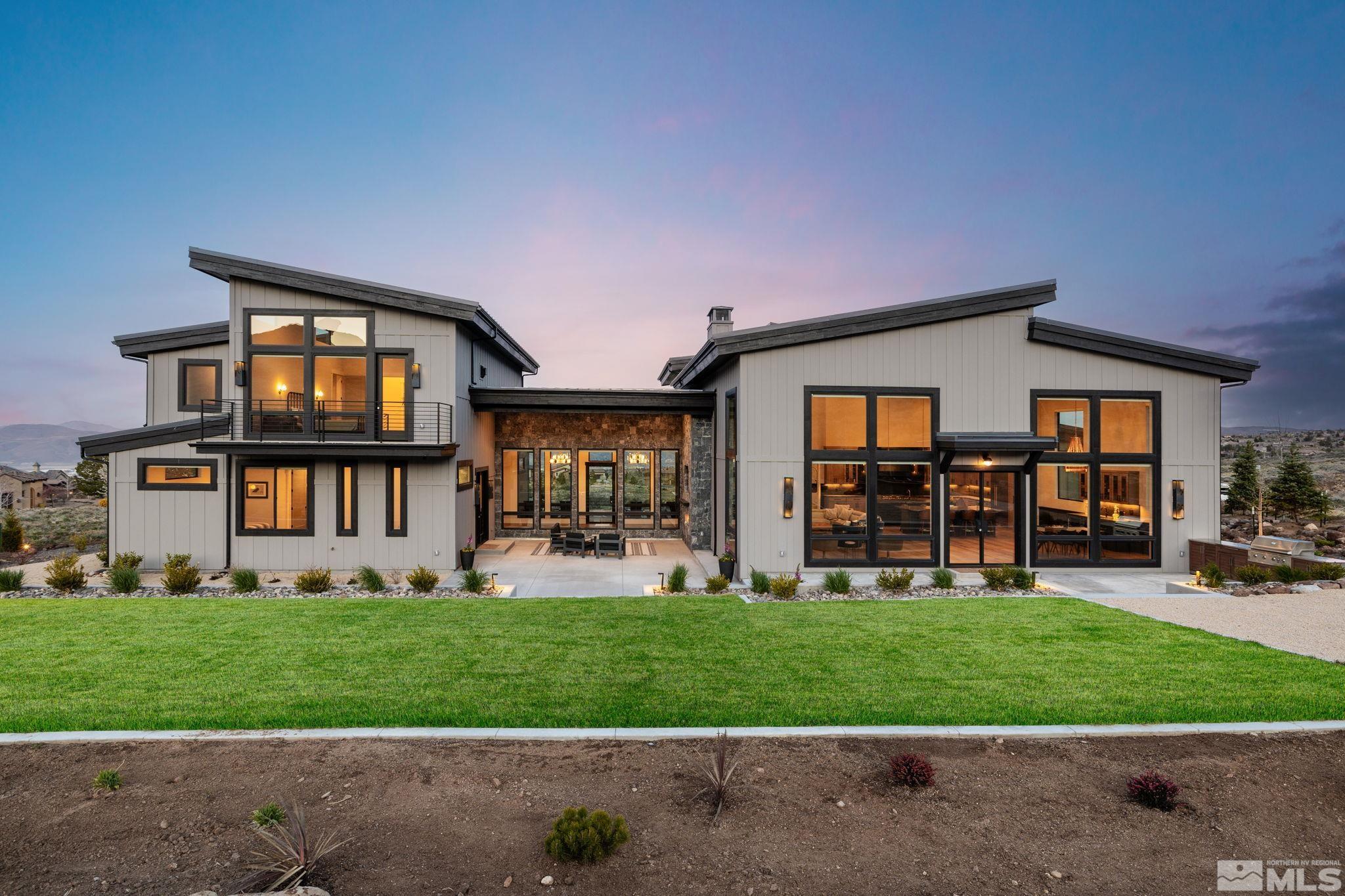 4225 Drop Tine Court Reno, NV 89511 - Photo 3 of 14 a front view of a house with a yard and trees