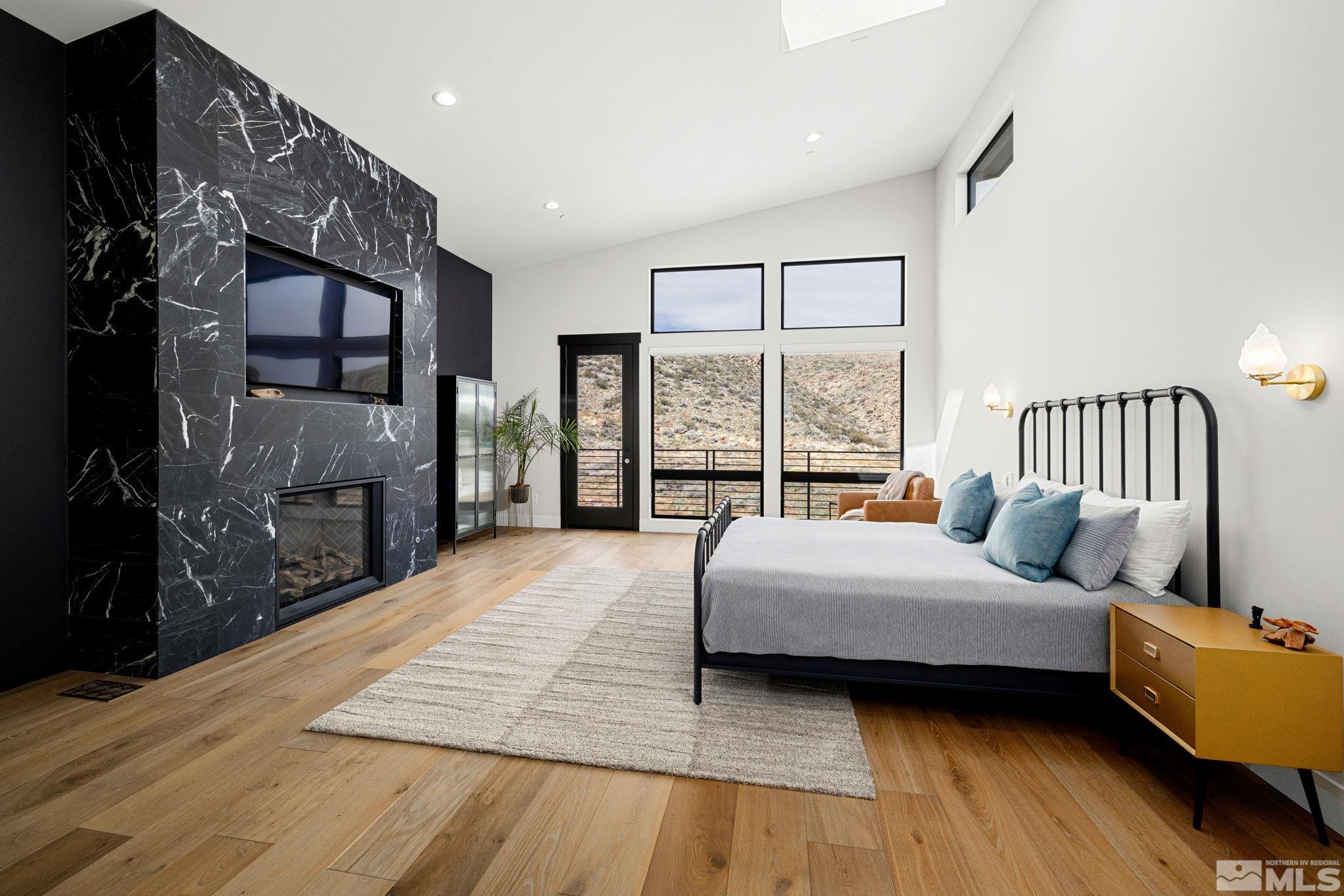 4225 Drop Tine Court Reno, NV 89511 - Photo 9 of 14 a bedroom with a bed and window