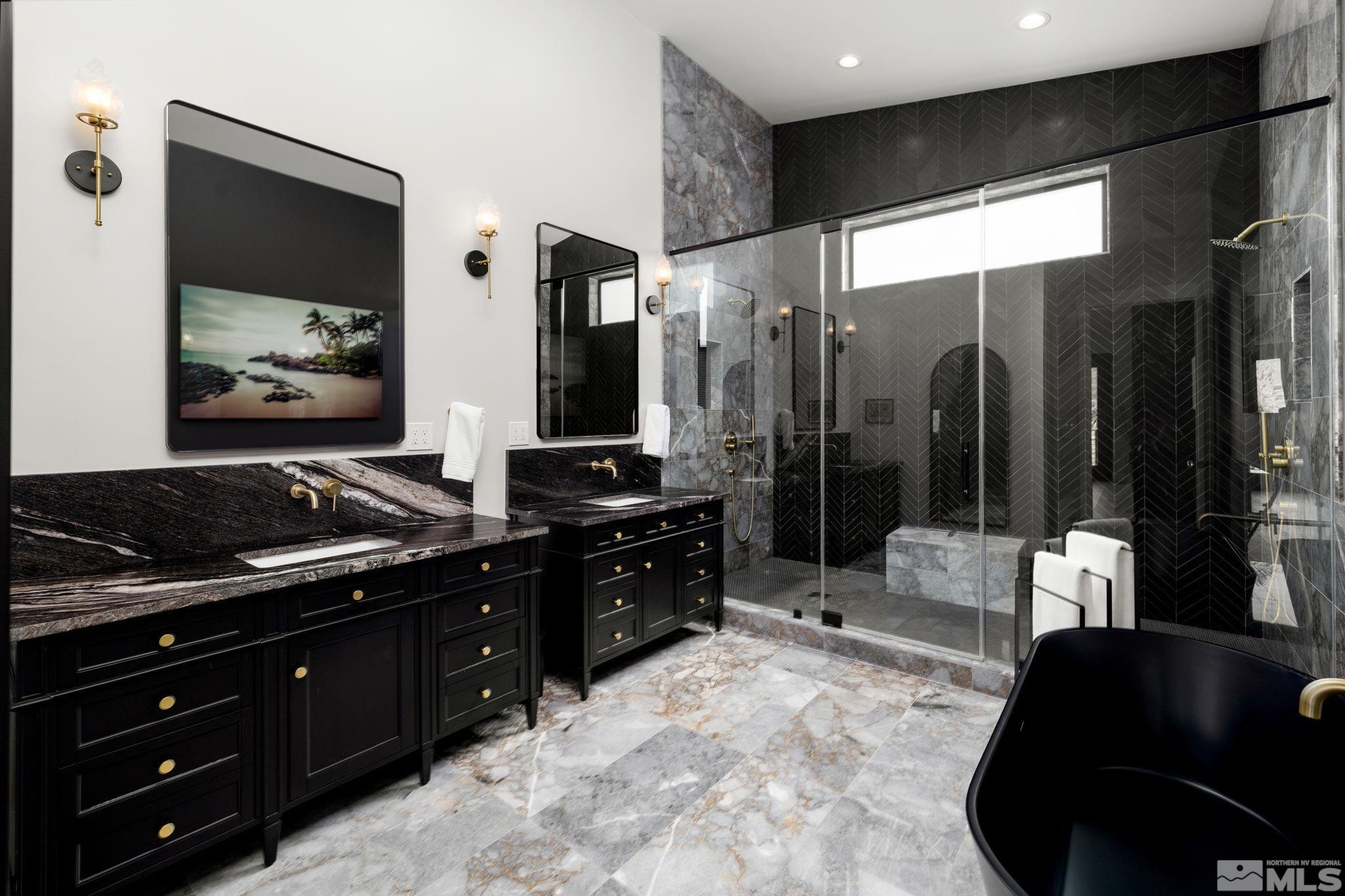 4225 Drop Tine Court Reno, NV 89511 - Photo 10 of 14 a kitchen with stainless steel appliances granite countertop a stove a sink and a refrigerator
