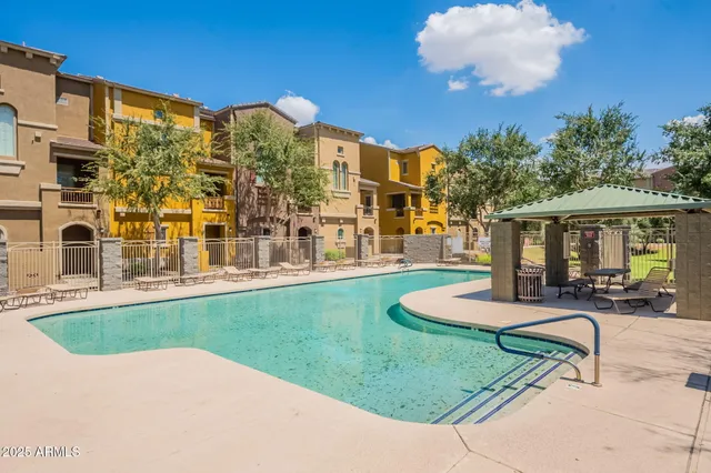 a view of a house with a swimming pool