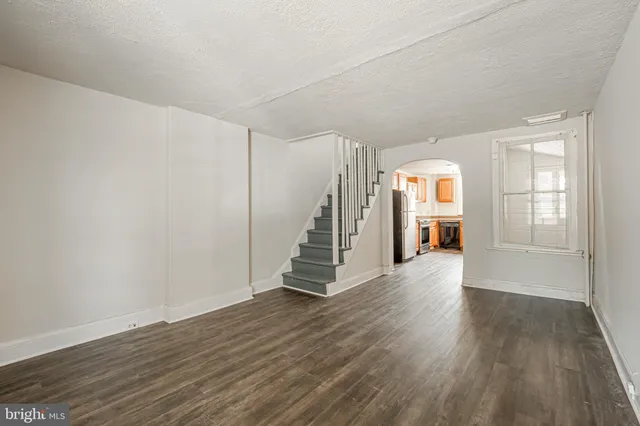 a view of entryway with wooden floor