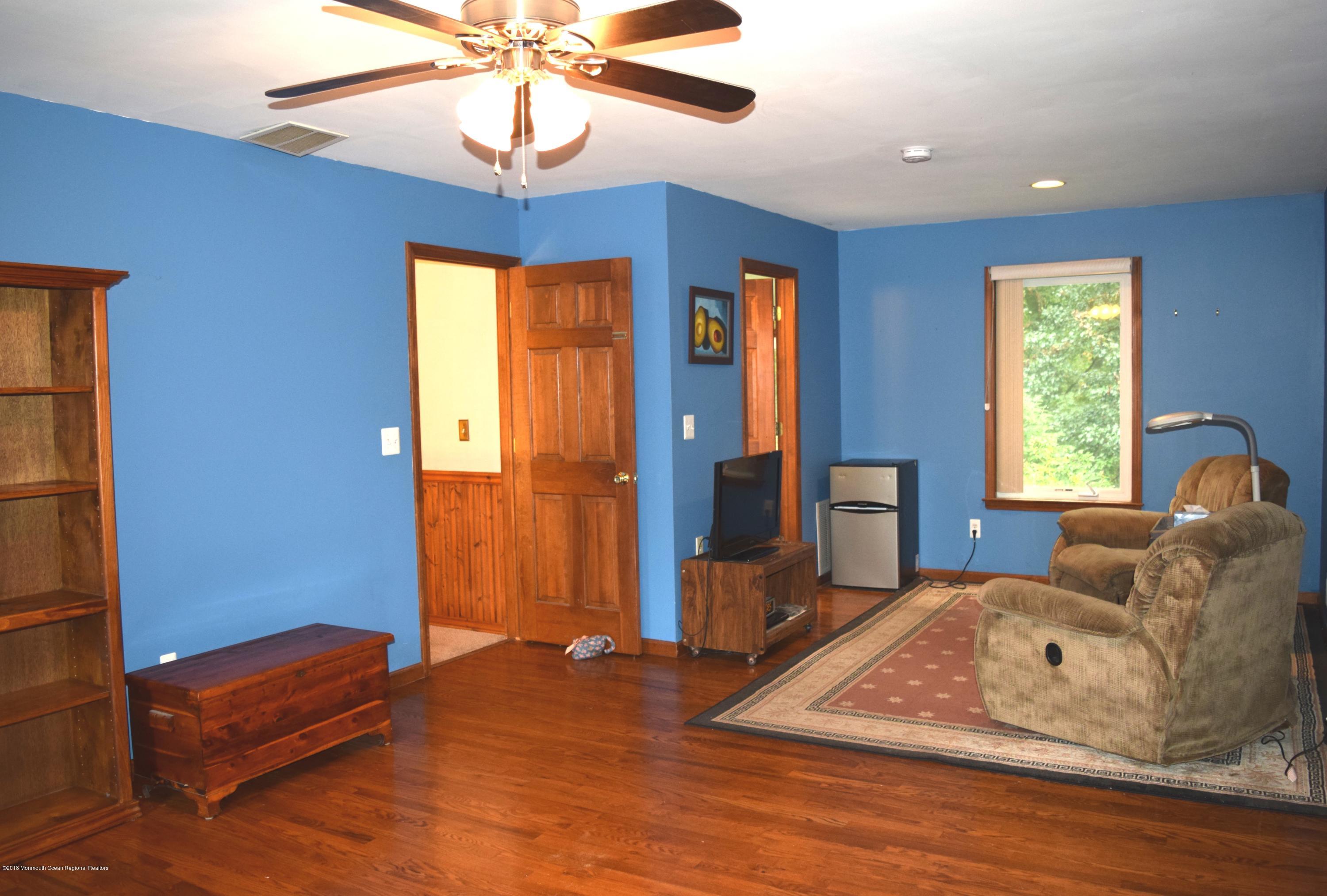 17 Dunhill Road Jackson, NJ 08527 - Photo 17 of 28 a living room with furniture and a window