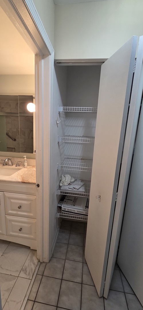 450 Raintree Court, Unit 2M Glen Ellyn, IL 60137 - Photo 13 of 25 a view of storage and utility room