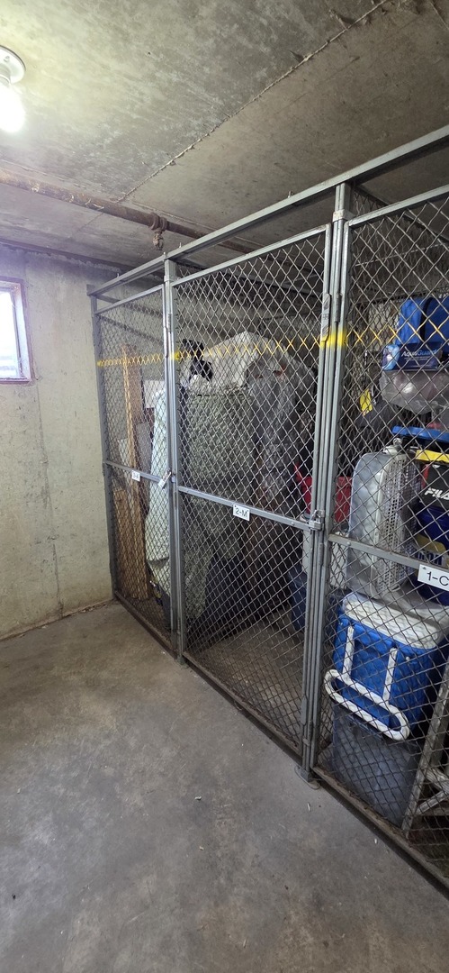 450 Raintree Court, Unit 2M Glen Ellyn, IL 60137 - Photo 5 of 25 a view of a room with wooden floor
