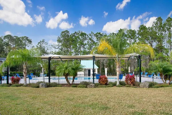 a view of a house with a garden
