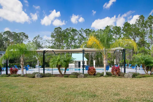 a view of a house with a garden