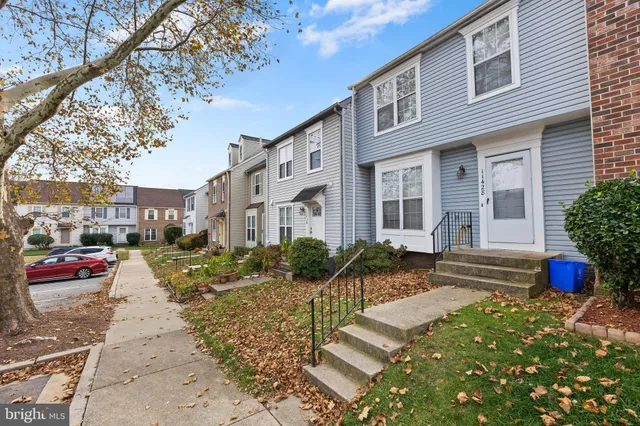 a front view of a house with outdoor space