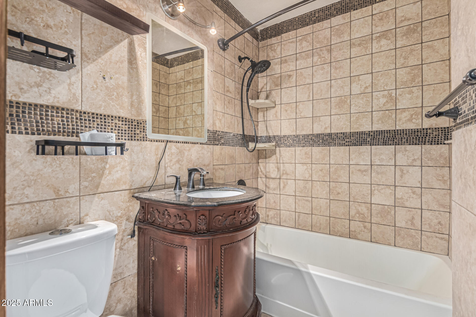 3812 West Thomas Road Phoenix, AZ 85019 - Photo 19 of 35 a bathroom with a sink a toilet and shower
