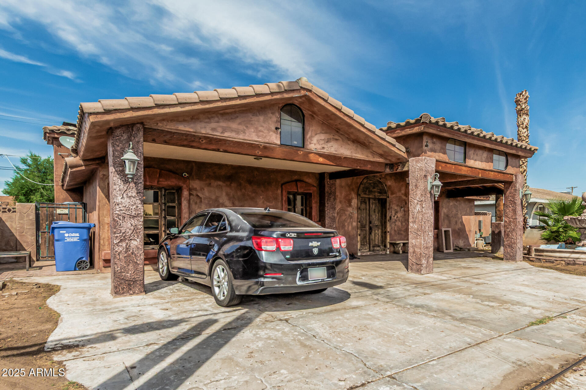 3812 West Thomas Road Phoenix, AZ 85019 - Photo 3 of 35 a car parked in front of house