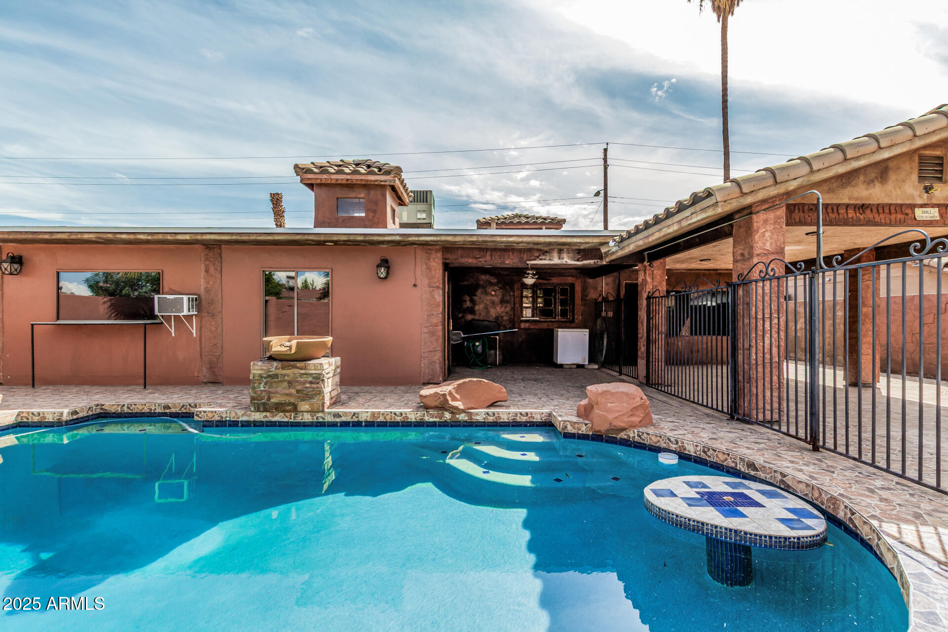 3812 West Thomas Road Phoenix, AZ 85019 - Photo 32 of 35 a backyard of a house with lots of green space