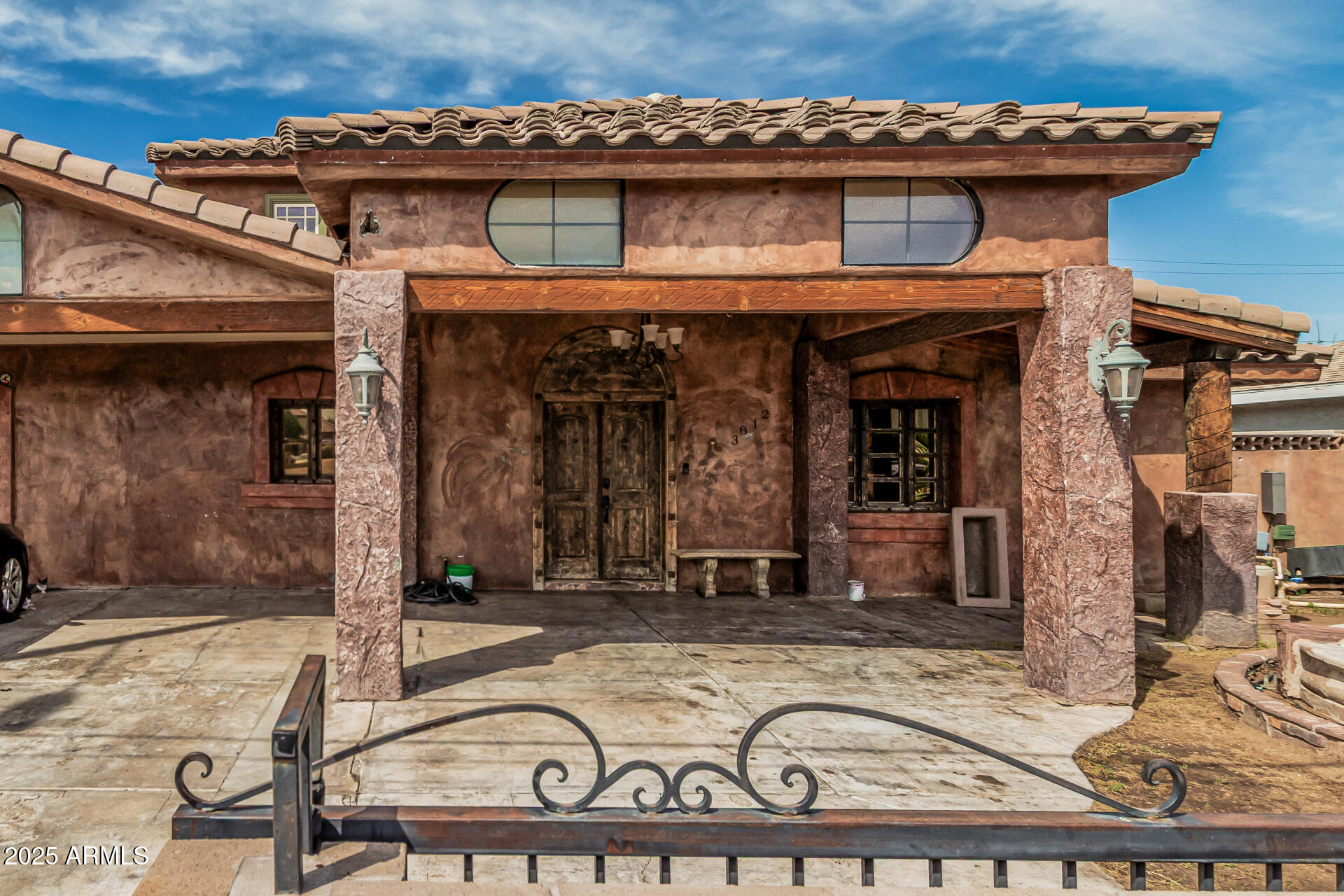 3812 West Thomas Road Phoenix, AZ 85019 - Photo 6 of 35 a view of a house with a balcony