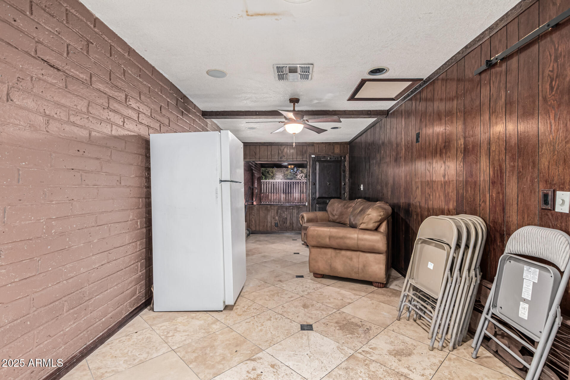 3812 West Thomas Road Phoenix, AZ 85019 - Photo 8 of 35 a living room with furniture and a fireplace