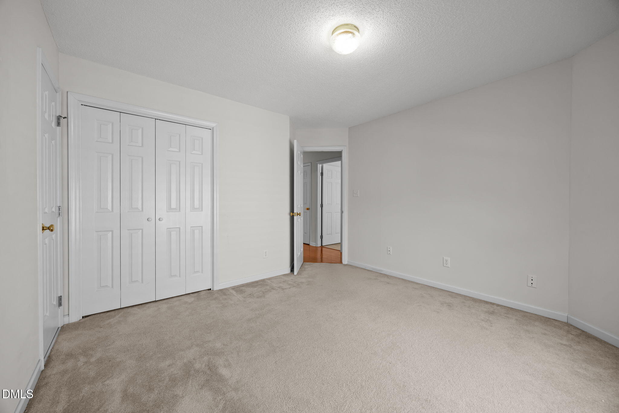 5501 Southern Cross Avenue Raleigh, NC 27606 - Photo 30 of 43 an empty room with an entryway
