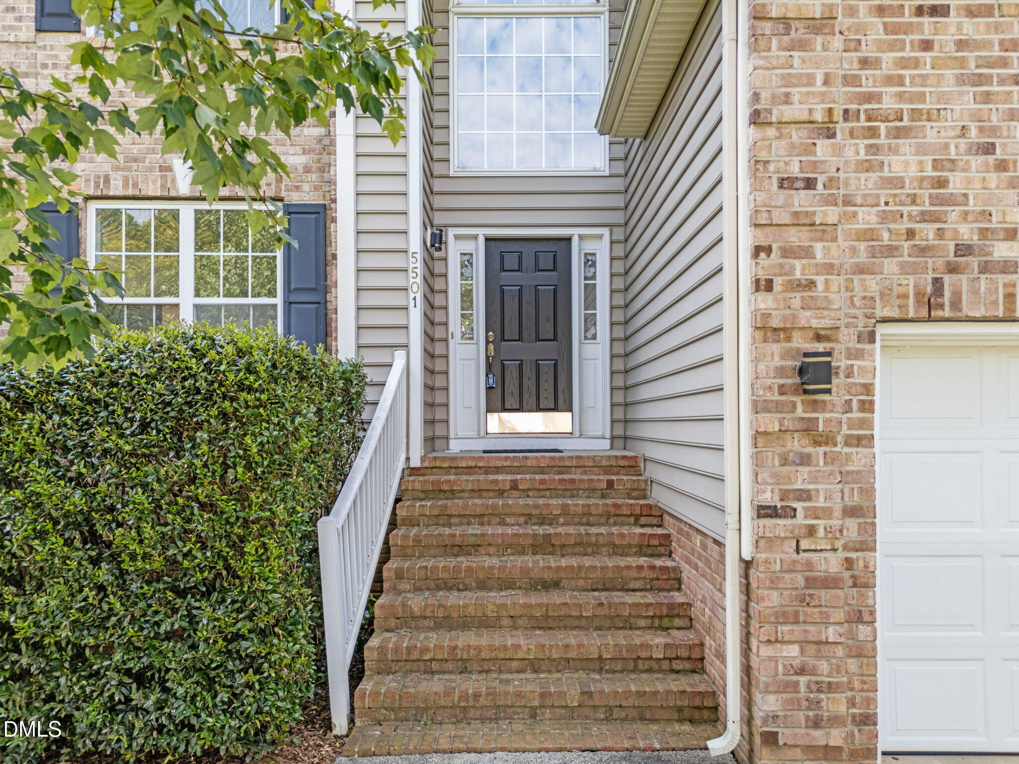 5501 Southern Cross Avenue Raleigh, NC 27606 - Photo 3 of 43 a view of a house with a window and stairs