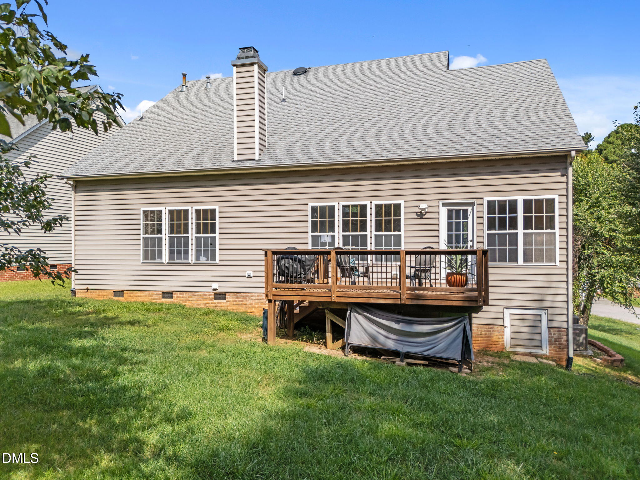 5501 Southern Cross Avenue Raleigh, NC 27606 - Photo 32 of 43 a view of a house with backyard and porch