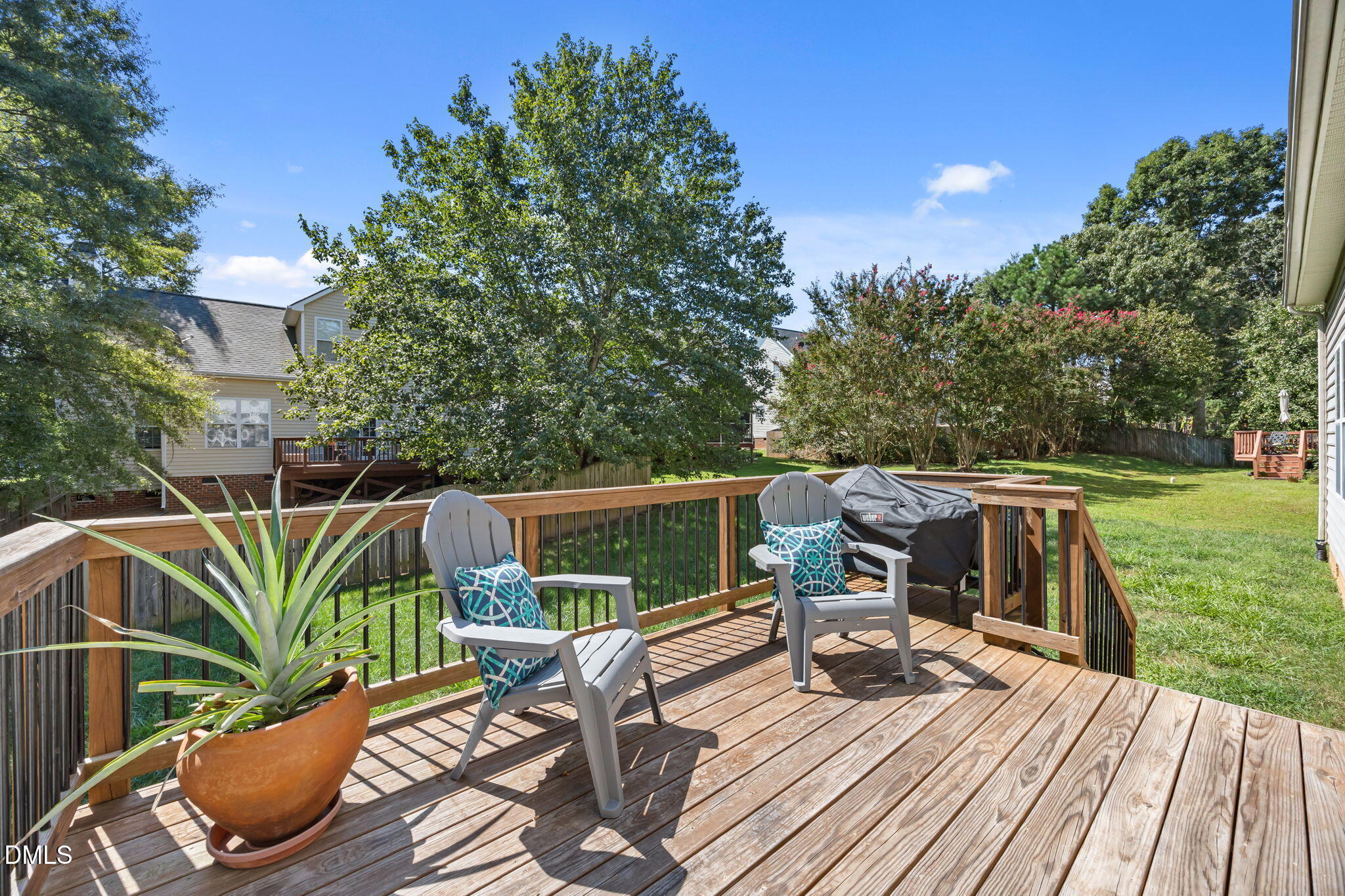 5501 Southern Cross Avenue Raleigh, NC 27606 - Photo 33 of 43 a view of balcony with furniture and garden