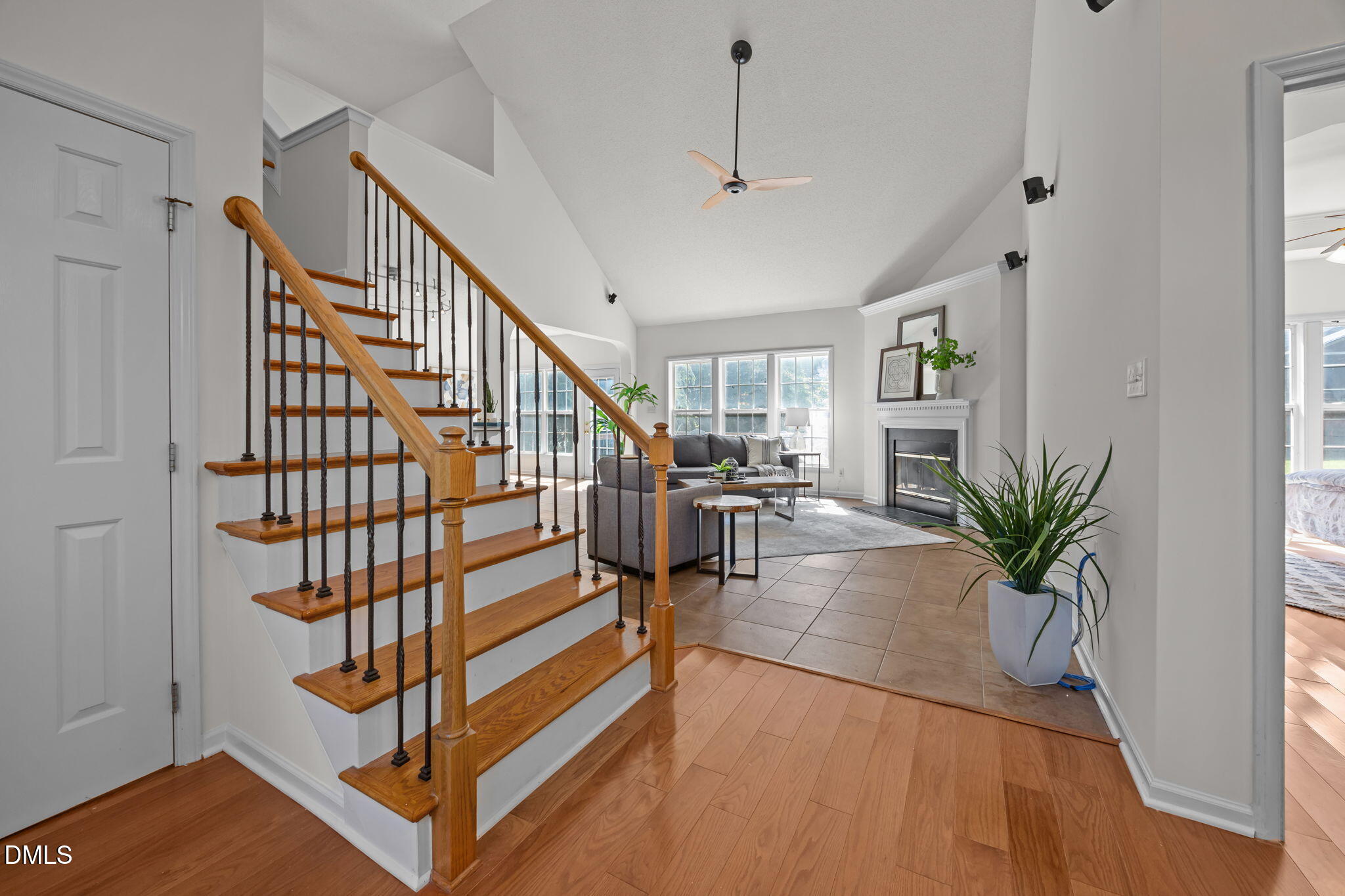 5501 Southern Cross Avenue Raleigh, NC 27606 - Photo 4 of 43 a view of entryway with wooden floor and a potted plant
