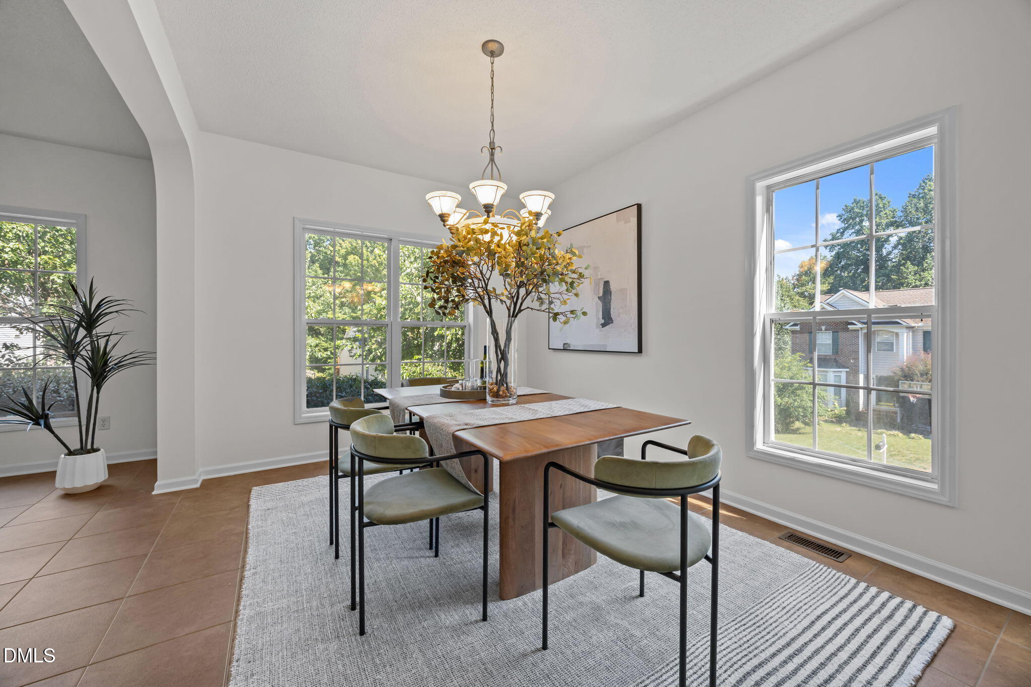 5501 Southern Cross Avenue Raleigh, NC 27606 - Photo 8 of 43 a view of a dining room with furniture window and outside view