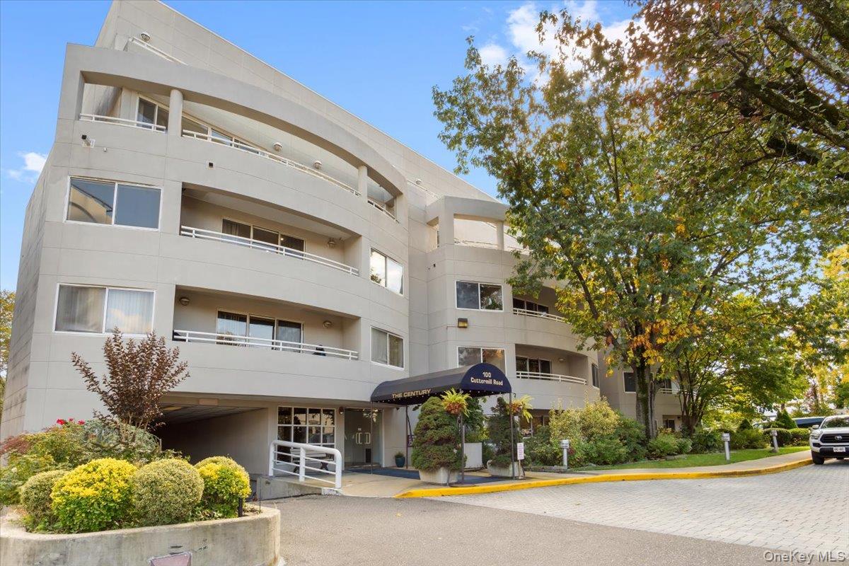100 Cutter Mill Road, Unit 3F Great Neck, NY 11021 - Photo 2 of 33 a view of a building with a garden and pathway