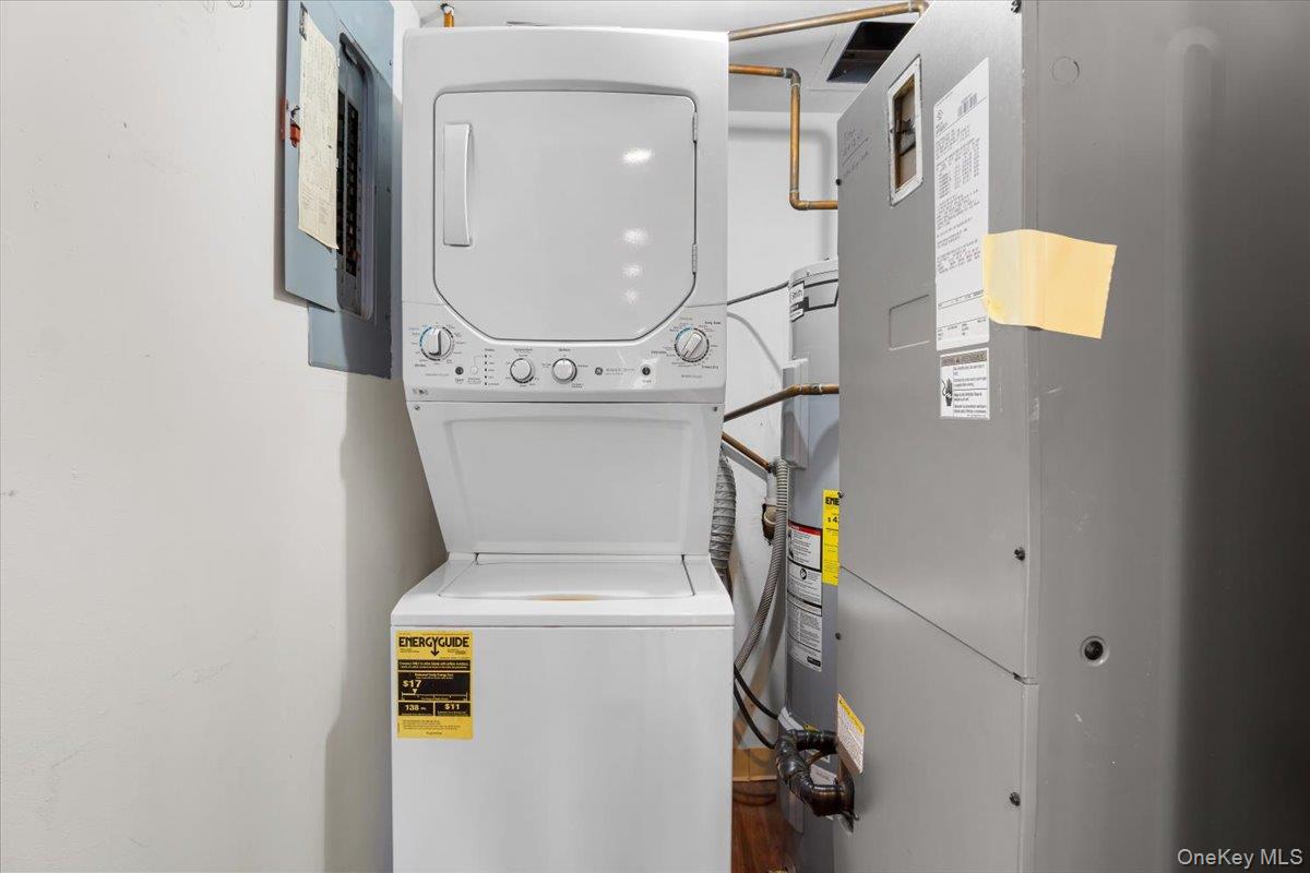 100 Cutter Mill Road, Unit 3F Great Neck, NY 11021 - Photo 33 of 33 a utility room with dryer and washer