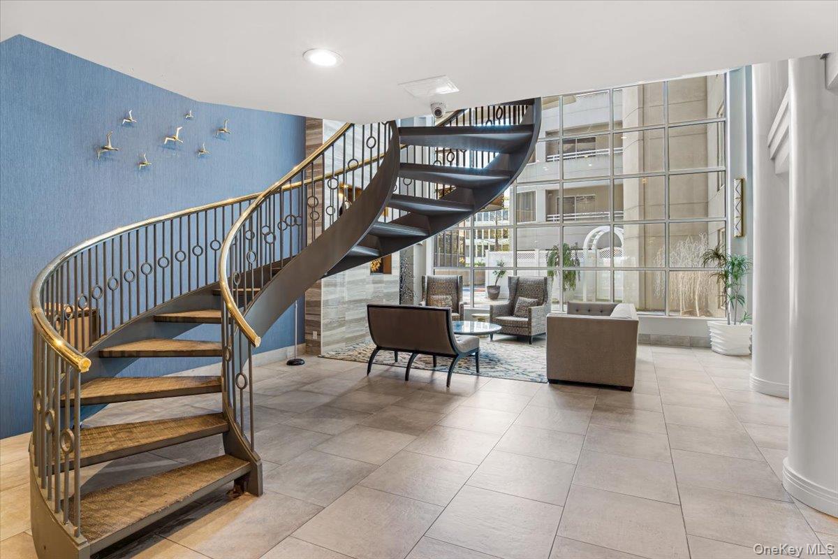 100 Cutter Mill Road, Unit 3F Great Neck, NY 11021 - Photo 6 of 33 a view of entryway and hall with dining room