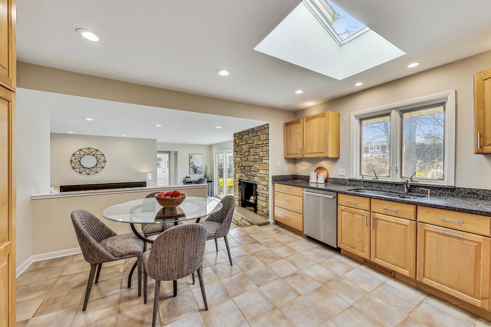 1724 Larkdale Road Northbrook, IL 60062 - Photo 9 of 31 a dining hall with stainless steel appliances granite countertop a dining table and chairs