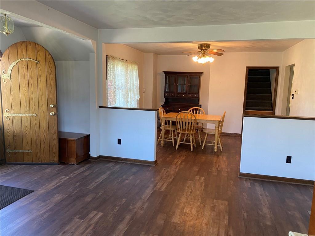 716 Winfield Road Cabot, PA 16023 - Photo 5 of 16 a living room with a table and a window