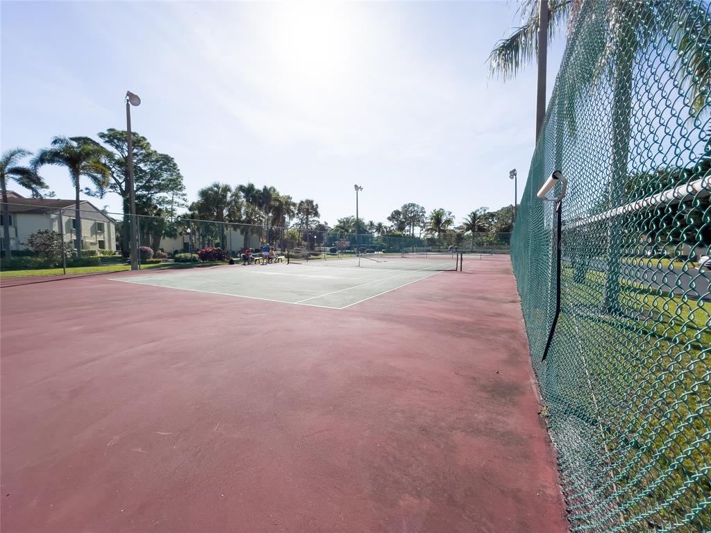 330 Knotty Pine Circle, Unit A1 Greenacres, FL 33463 - Photo 20 of 30 a view of a basket ball ground