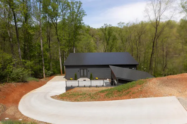 a house view with a backyard space