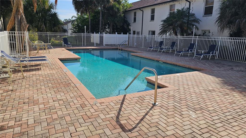3651 North Goldenrod Road, Unit C205 Winter Park, FL 32792 - Photo 10 of 11 a view of a backyard with sitting area
