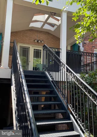 a front view of a building with street view