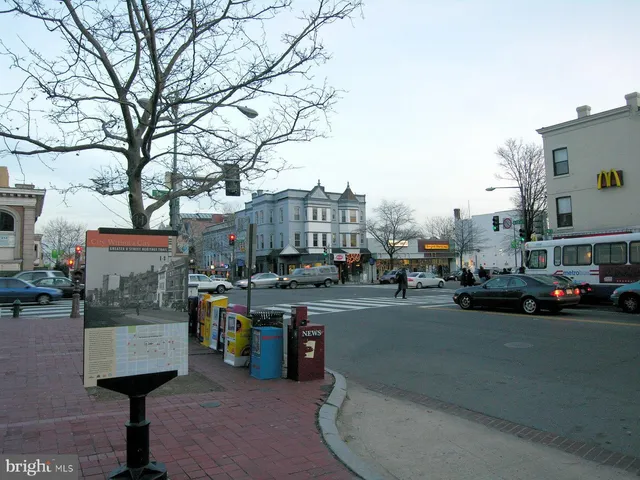 a view of a building with a street