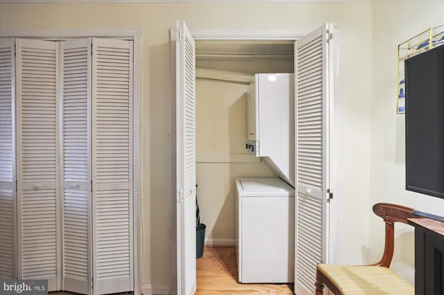 a view of a hallway with seating area