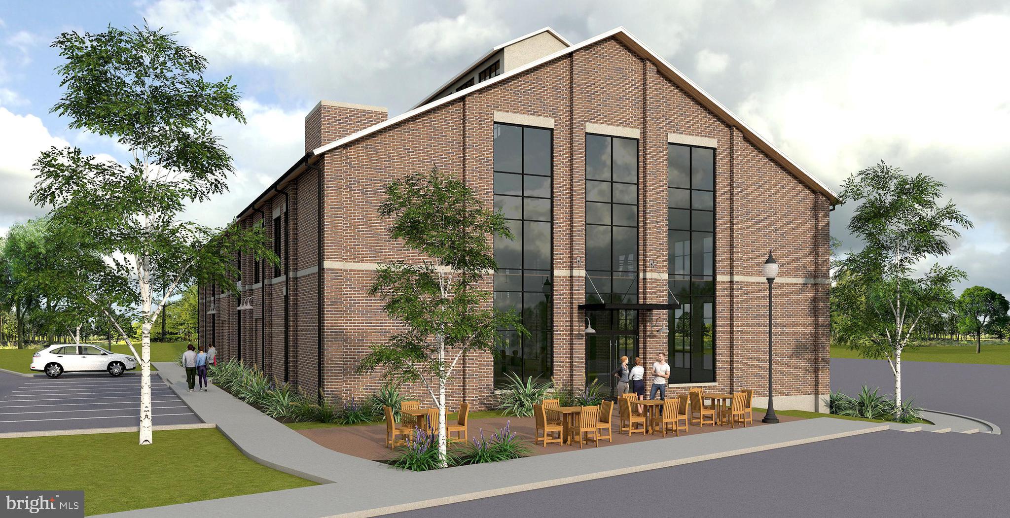 3474 Old Philadelphia, Unit 2 Intercourse, PA 17534 - Photo 3 of 5 a backyard of a house with table and chairs plants and trees