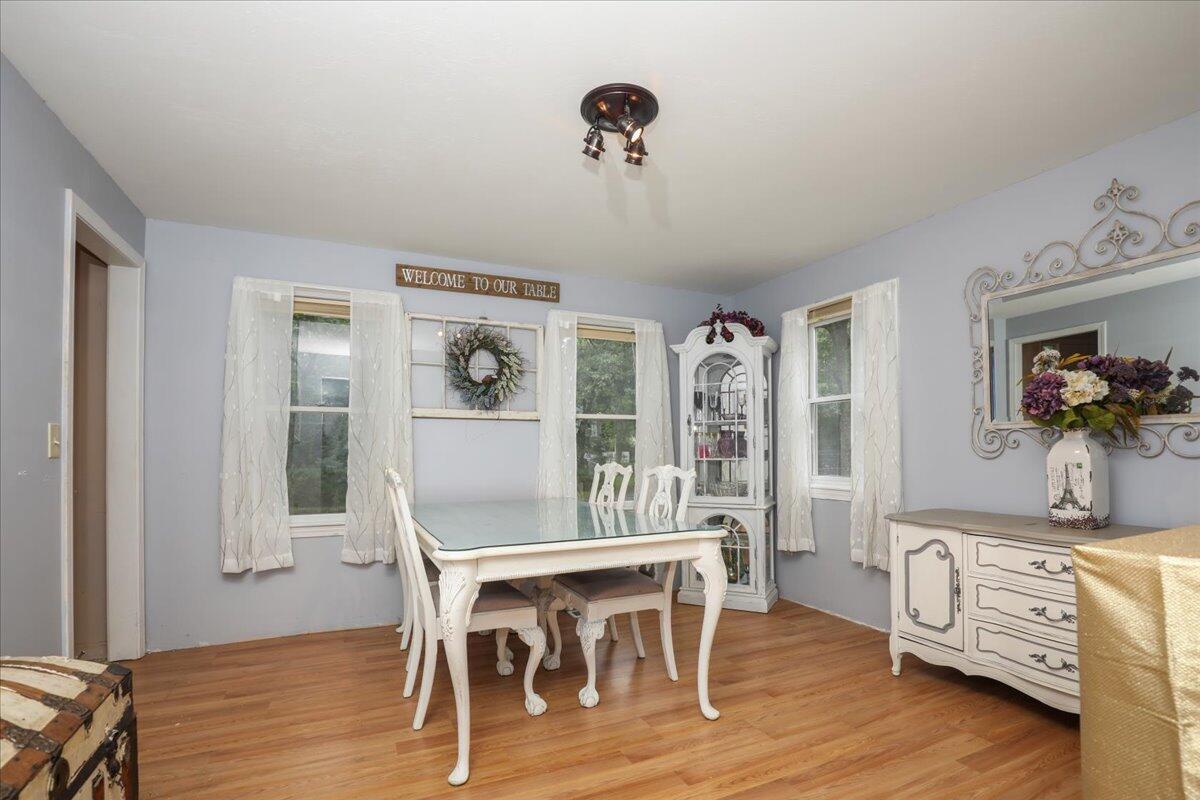 22 Dana Road Forestdale, MA 02644 - Photo 4 of 15 a view of a dining room with furniture wooden floor and chandelier