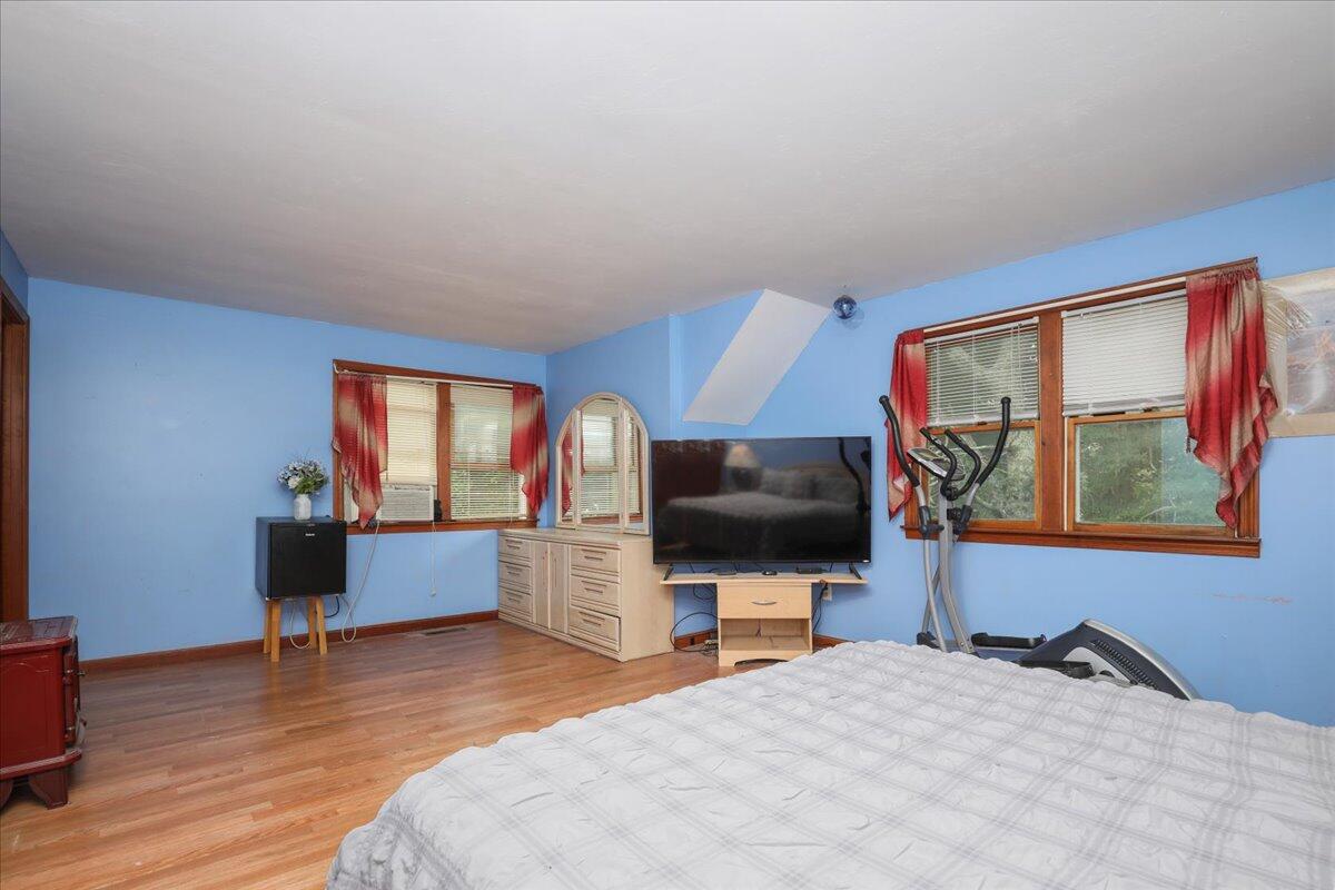 22 Dana Road Forestdale, MA 02644 - Photo 10 of 15 a bedroom with a bed and a flat screen tv